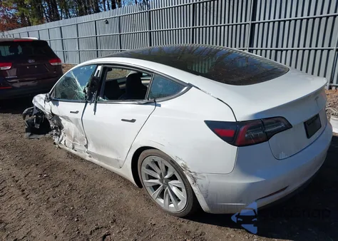 2021 Tesla Model 3 Standard Range Plus Rear-Wheel Drive z USA, uszkodzony, nr VIN 5YJ3E1EAXMF987008